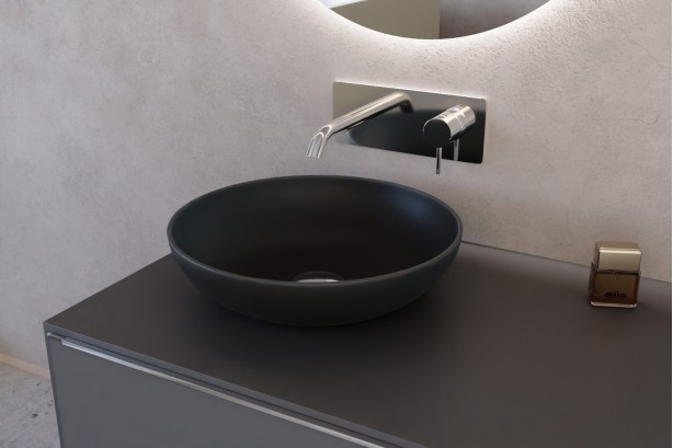 IZENA Black solid surface basin, side view